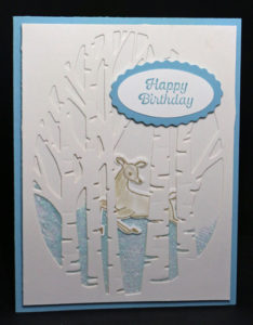 Make two cards from one design like this charming winter card with birch trees and a deer.
