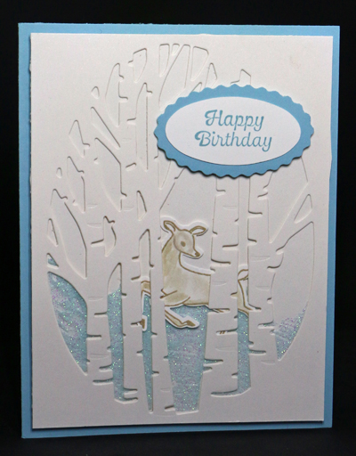 Make two cards from one design like this charming winter card with birch trees and a deer.